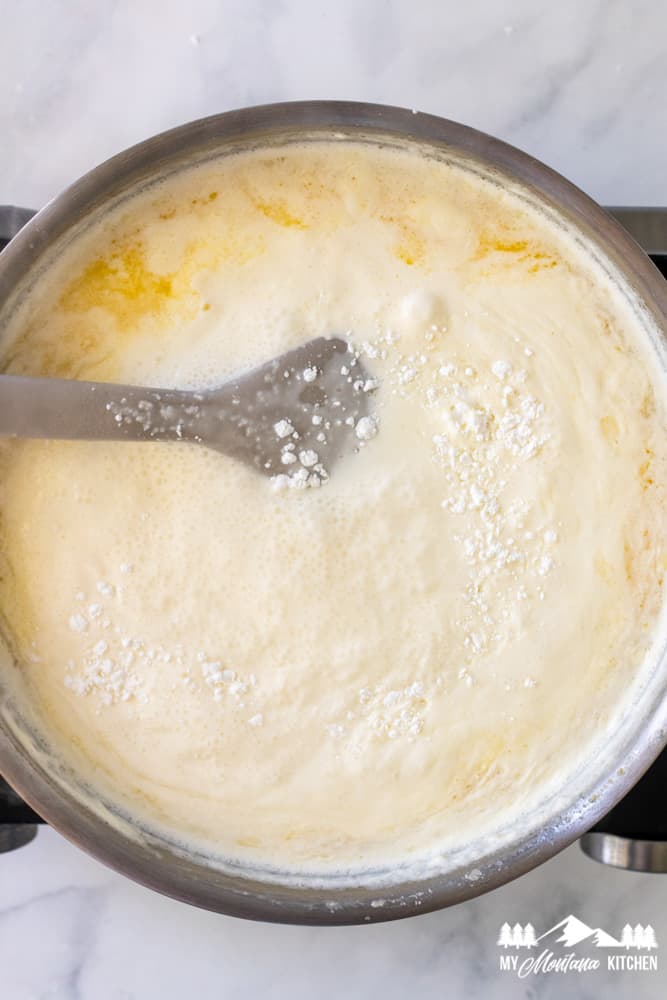 alfredo sauce with parmesan in skillet