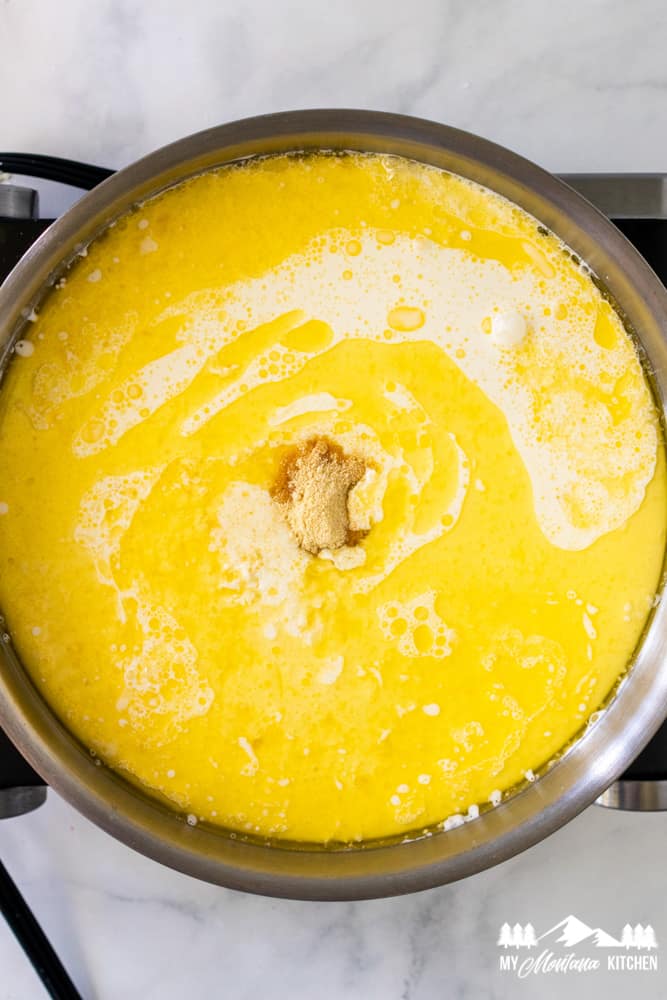 melting butter for shrimp alfredo in skillet