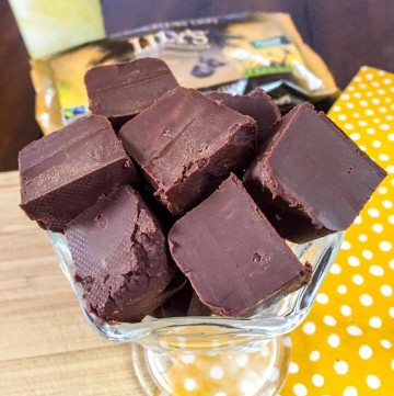 Try this easy condensed milk fudge recipe for an easy, healthy chocolate dessert. This 2 ingredient low carb fudge is sugar free, which means it will soon become one of your favorite THM dessert recipes. This holiday microwave fudge recipe will have everyone who tries it amazed! #ketofudge #thmdessertrecipe #microwavefudge #sugarfreefudge