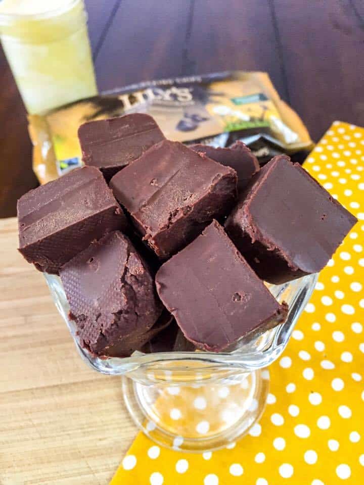 Try this easy condensed milk fudge recipe for an easy, healthy chocolate dessert. This 2 ingredient low carb fudge is sugar free, which means it will soon become one of your favorite THM dessert recipes. This holiday microwave fudge recipe will have everyone who tries it amazed! #ketofudge #thmdessertrecipe #microwavefudge #sugarfreefudge