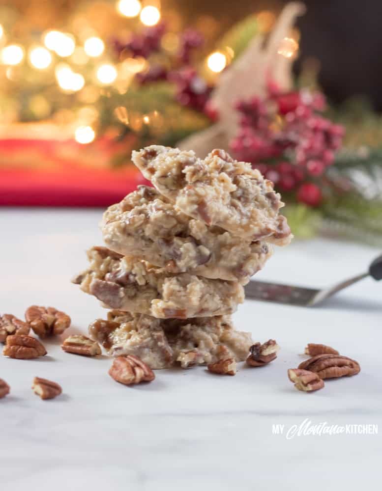 A handful of ingredients, and 15 minutes is all it takes to make these low carb Holiday Praline No-Bake Cookies. These sugar free cookies are great for keto Christmas Cookie trays! Filled with coconut, pecans, and a low carb sweetened condensed milk, these keto Christmas cookies are perfect! #ketocookie #sugarfree #lowcarbcookie #thmcookie #christmascookie #healthychristmascookie #keto #lowcarb #pralines #holidaypralines #nobakecookie
