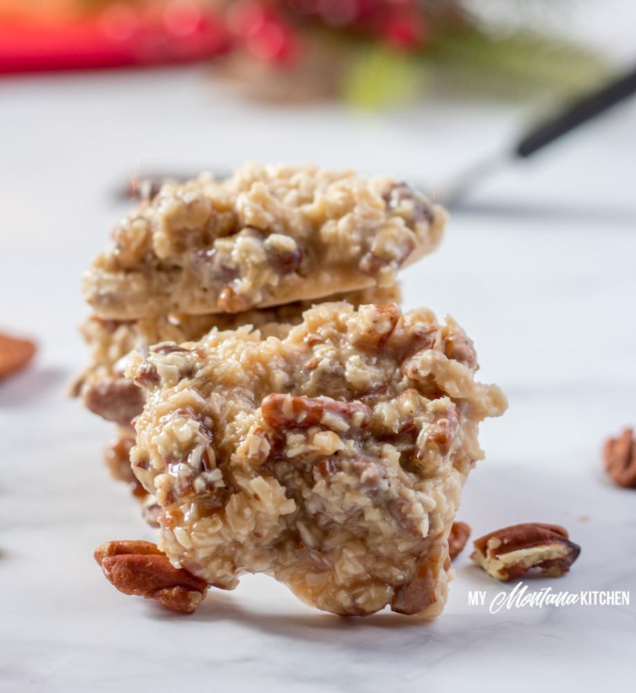 A handful of ingredients, and 15 minutes is all it takes to make these low carb Holiday Praline No-Bake Cookies. These sugar free cookies are great for keto Christmas Cookie trays! Filled with coconut, pecans, and a low carb sweetened condensed milk, these keto Christmas cookies are perfect! #ketocookie #sugarfree #lowcarbcookie #thmcookie #christmascookie #healthychristmascookie #keto #lowcarb #pralines #holidaypralines #nobakecookie 