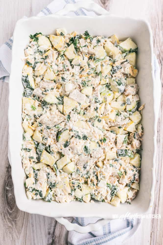 An easy low carb chicken casserole that makes healthy dinners a breeze! Filled with fresh vegetables and plenty of flavor, this easy cheesy chicken casserole will be a family favorite! #lowcarbchickencasserole #easyhealthydinner