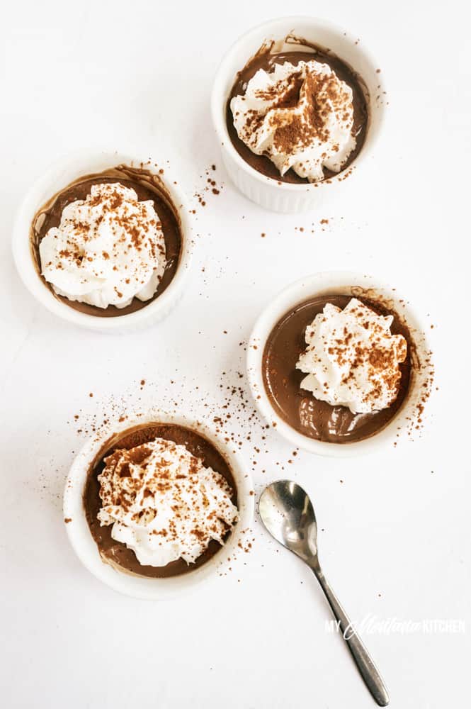 sugar free chocolate pudding in white dish with whipped cream