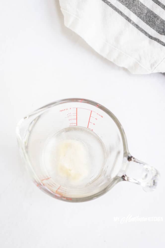 gelatin and water in glass measuring cup