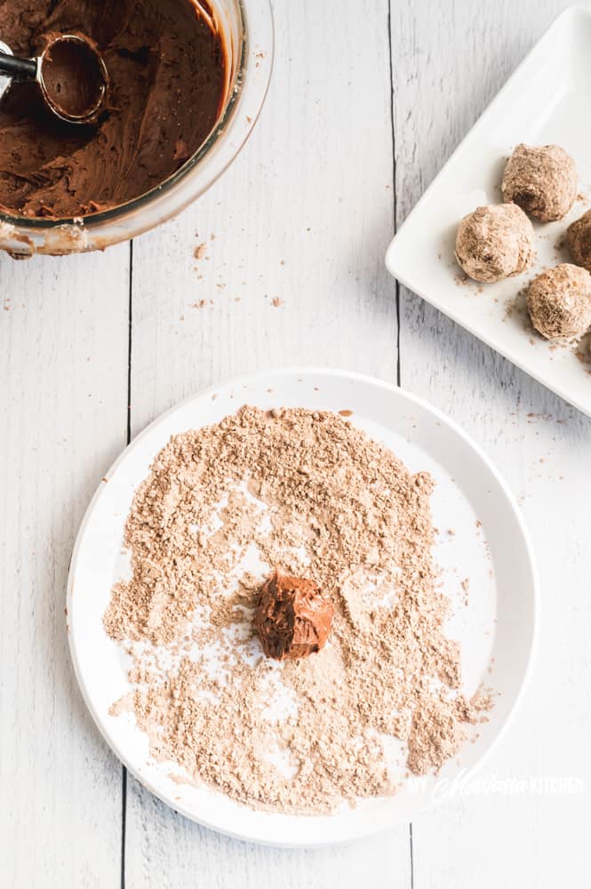 These easy keto chocolate truffles with cream cheese are sugar free, and flavored with a swirl of rich coffee, making them a decadent low carb dark chocolate dessert recipe! #ketotruffles #lowcarbchocolatedessert