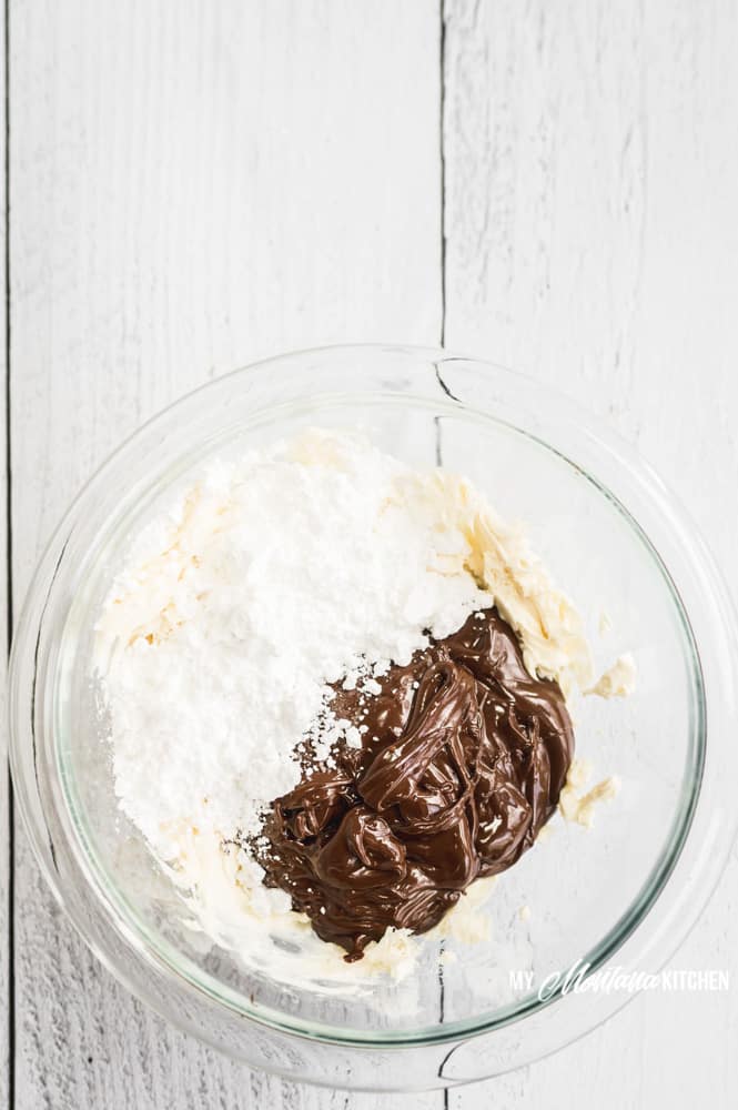 These easy keto chocolate truffles with cream cheese are sugar free, and flavored with a swirl of rich coffee, making them a decadent low carb dark chocolate dessert recipe! #ketotruffles #lowcarbchocolatedessert