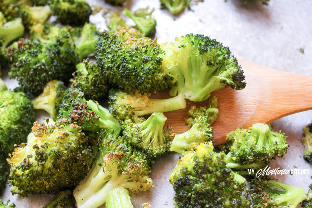 A quick and easy side dish, this Oven Roasted Broccoli Recipe only uses a handful of ingredients, but is delicious enough to become your new favorite low carb side dish! #roastedbroccoli #broccolirecipe