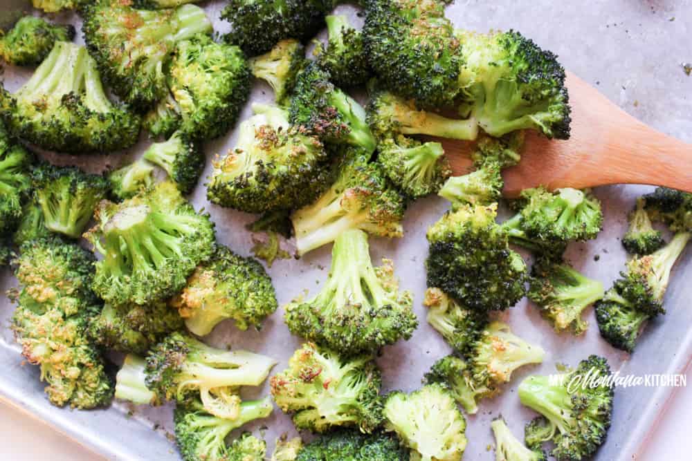 A quick and easy side dish, this Oven Roasted Broccoli Recipe only uses a handful of ingredients, but is delicious enough to become your new favorite low carb side dish! #roastedbroccoli #broccolirecipe