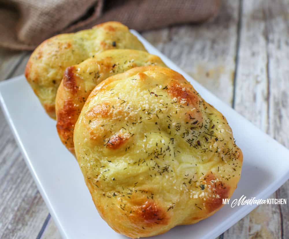 These low carb chicken bundles are made with cream cheese, chicken, and a pop of dill and then wrapped in mozzarella dough and baked to golden perfection. #trimhealthymama #thm #thms #lowcarb #keto #mozzarelladough #chickenbundles #dinnerideas #mymontanakitchen #healthydinner