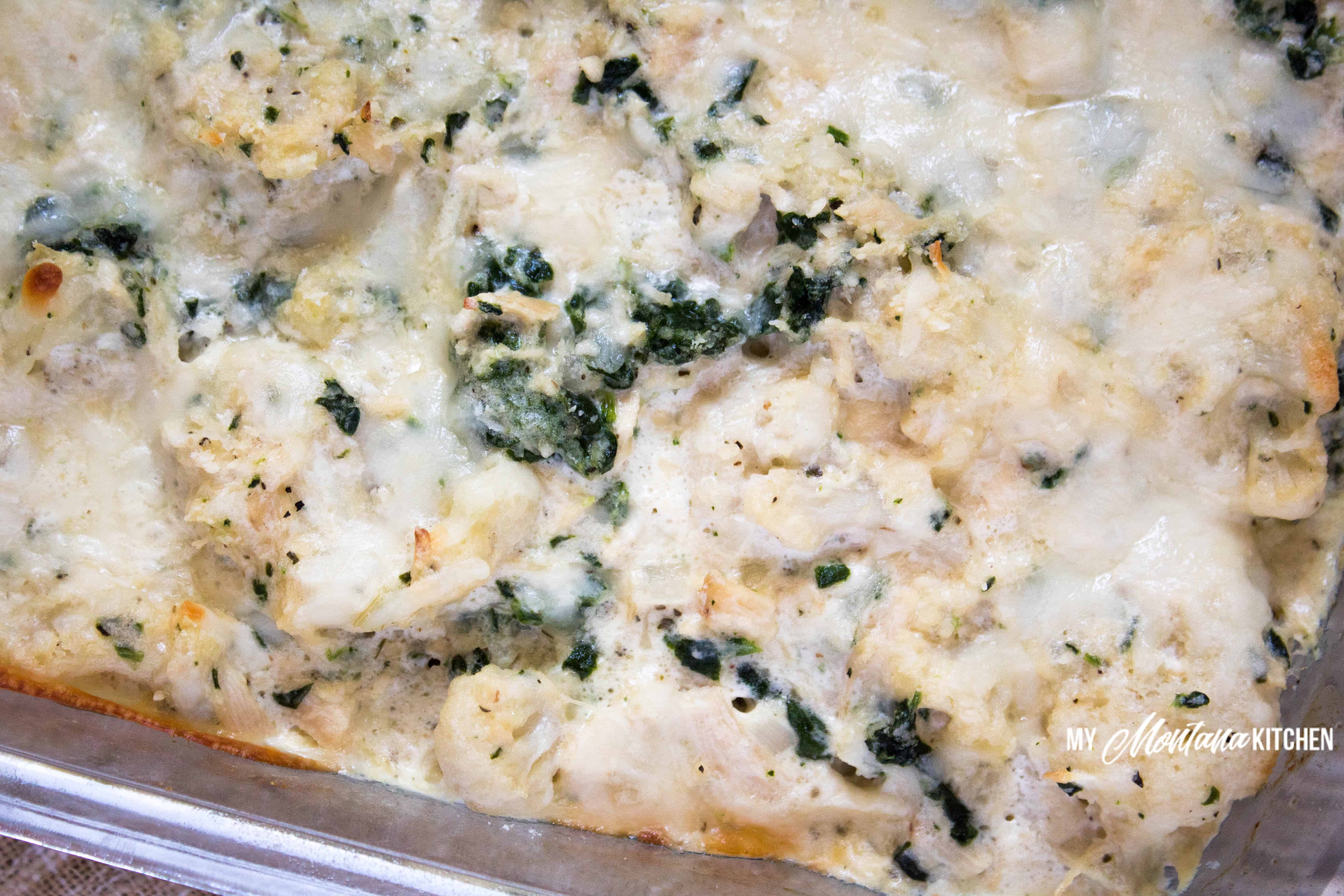 Who loves Alfredo? (I do!) This easy casserole recipe is creamy, cheesy, and low carb - filled with all the flavors of your favorite Alfredo dish. #lowcarb #ketoalfredo #alfredo #keto #trimhealthymama #casserole