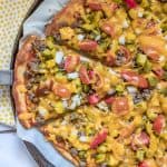 Combine the best of both cheeseburgers and pizza and you have a delicious and easy dinner idea - Cheeseburger Pizza! Using a low carb crust and lots of toppings, this keto pizza is perfect for a family dinner! #trimhealthymama #thm #lowcarb #keto #cheeseburger #pizza #groundbeef #easyrecipe #glutenfree