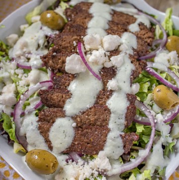If you've been wondering how to make a Gyro Salad, look no further! This savory salad has all the flavor of Greek Gyros, and it makes a delicious healthy dinner! Even my kids loved this healthy entree! #trimhealthymama #thm #ketosalad #lowcarb #gyrosalad #greeksalad #greek