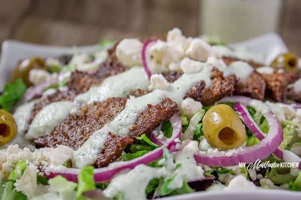 If you've been wondering how to make a Gyro Salad, look no further! This savory salad has all the flavor of Greek Gyros, and it makes a delicious healthy dinner! Even my kids loved this healthy entree! #trimhealthymama #thm #ketosalad #lowcarb #gyrosalad #greeksalad #greek