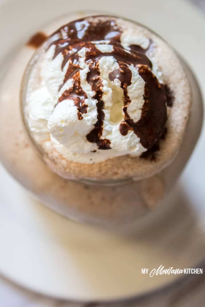 This Mocha Frappuccino Recipe is a decadent low carb coffee drink. Perfect for summer, or any time of the year, this low carb iced coffee is sure to keep you cool! #trimhealthymama #thm #thmcoffee #icedcoffee #lowcarb #keto #sugarfree #mymontanakitchen #lowcarbcoffee