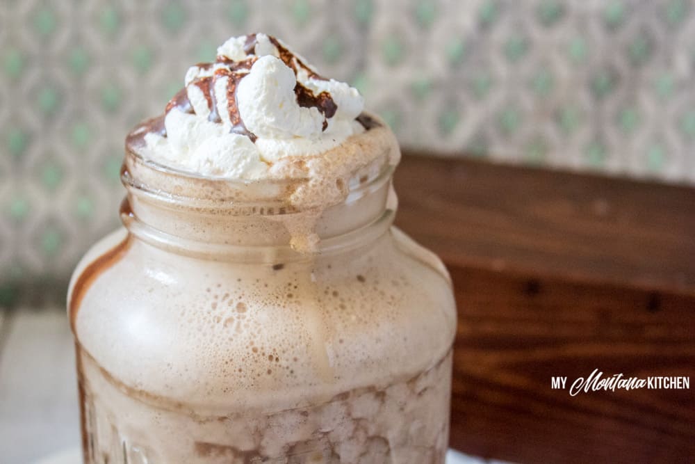 This Mocha Frappuccino Recipe is a decadent low carb coffee drink. Perfect for summer, or any time of the year, this low carb iced coffee is sure to keep you cool! #trimhealthymama #thm #thmcoffee #icedcoffee #lowcarb #keto #sugarfree #mymontanakitchen #lowcarbcoffee