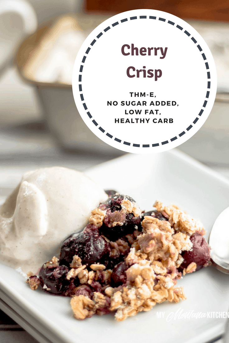 Sweet cherries topped with an easy oatmeal crust. This Cherry Crisp Recipe is easy to make and is a great way to use frozen cherries for a delicious Trim Healthy Mama E Dessert. #trimhealtheymama #thm #thme #lowfat #healthycarbs #cherries #crisp #thmedessert #thmdessert #trimhealthymamaefuel #mymontanakitchen #nosugaradded #dairyfree #glutenfree