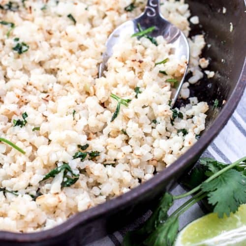 You can have Cilantro Lime Cauliflower rice can be ready and on your table in 15 minutes. This easy low carb side dish is filled with the fresh flavors of garlic and lime. Perfect as a Trim Healthy Mama Side Dish recipe, too! #trimhealthymama #thm #thms #lowcarb #keto #caulirice #cauliflowerrice #ricedcauliflower #mexican #cilantro #lime #cilantrolime