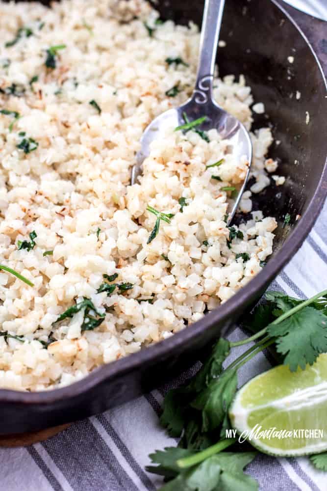 You can have Cilantro Lime Cauliflower rice can be ready and on your table in 15 minutes. This easy low carb side dish is filled with the fresh flavors of garlic and lime. Perfect as a Trim Healthy Mama Side Dish recipe, too! #trimhealthymama #thm #thms #lowcarb #keto #caulirice #cauliflowerrice #ricedcauliflower #mexican #cilantro #lime #cilantrolime