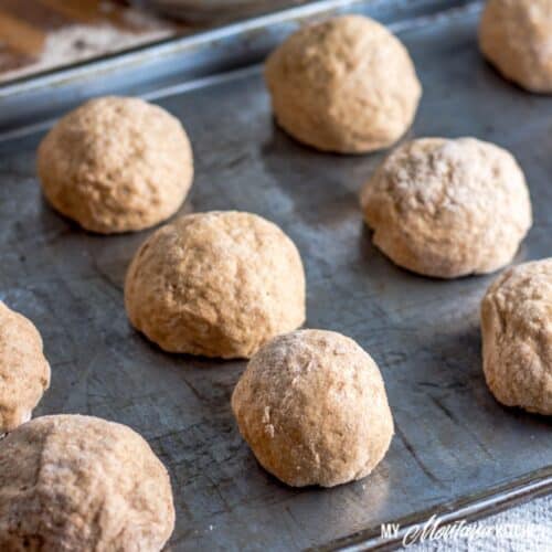 sprouted flour rolls on baking sheet