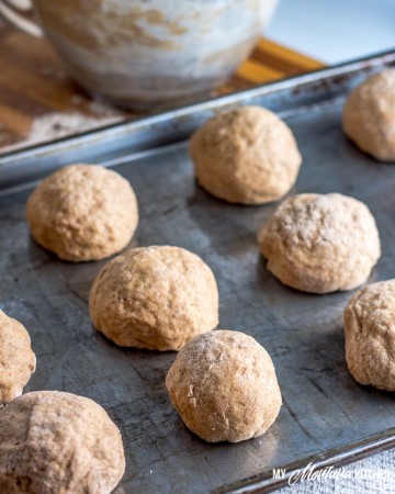 It only takes 30 minutes from start to finish to make these Sprouted Wheat 30 Minute Rolls. Healthy, filling, and they can be enjoyed as a Trim Healthy Mama E recipe. Quick, healthy, and sure to be a family-pleasing recipe! #trimhealthymama #thm #thm-e #lowfat #sproutedflour #30minuterolls #realfood #mymontanakitchen #thmbread
