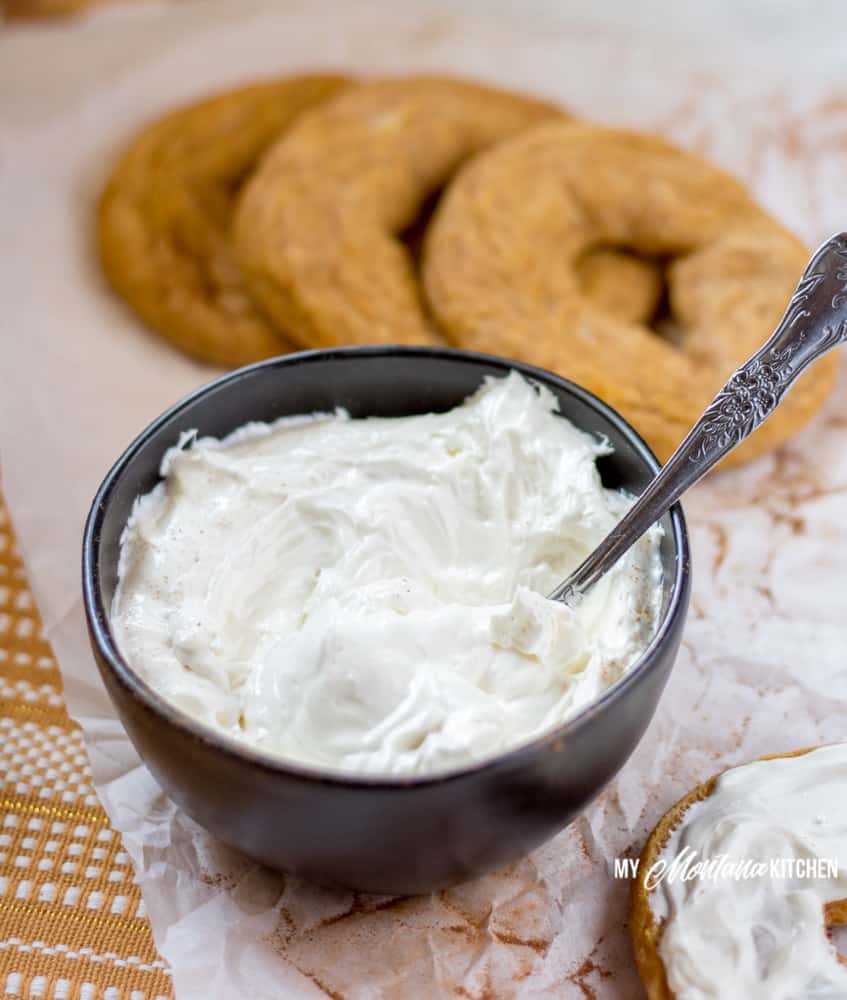 This keto Whipped Cream Cheese Spread is the perfect topping for low carb pumpkin bagels! #keto #lowcarb #trimhealthymama #glutenfree #sugarfree #pumpkinspice #pumpkinbagel #bagels #mymontanakitchen