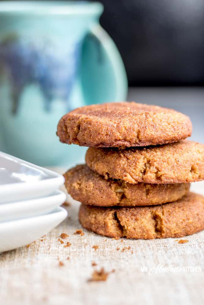 Sweet, dense pumpkin cookies filled with a rich layer of sweetened cream cheese. These low carb, sugar free Pumpkin Snickerdoodles are are the cookies of your low carb dreams! These pumpkin cookies make the perfect low carb pumpkin dessert! #trimhealthymama #thm #thms #lowcarb #keto #glutenfree #sugarfree #pumpkin #pumpkincookies #snickerdoodles #creamcheese #pumpkinsnickerdoodles #mymontanakitchen