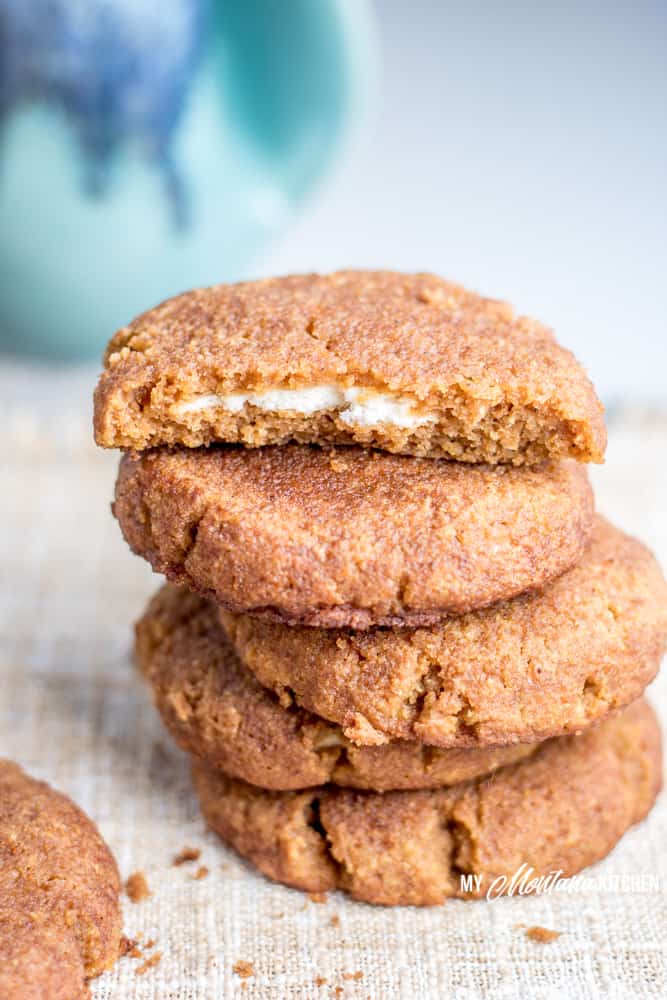 Sweet, dense pumpkin cookies filled with a rich layer of sweetened cream cheese. These low carb, sugar free Pumpkin Snickerdoodles are are the cookies of your low carb dreams! These pumpkin cookies make the perfect low carb pumpkin dessert! #trimhealthymama #thm #thms #lowcarb #keto #glutenfree #sugarfree #pumpkin #pumpkincookies #snickerdoodles #creamcheese #pumpkinsnickerdoodles #mymontanakitchen