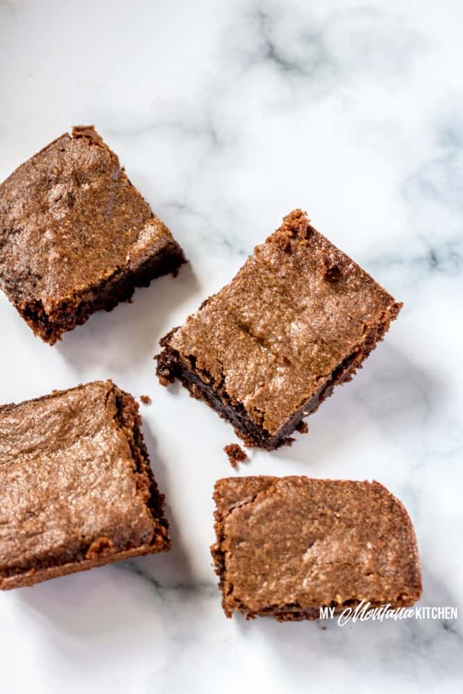 Rich, decadent, fudgy Chocolate Peanut Butter Brownies that can be made in less than 30 minutes! These low carb brownies make an excellent keto dessert, and they are sugar free and gluten free as well! Chocolate Peanut Butter Brownies will be a new favorite healthy dessert recipe! #trimhealthymama #thm #thms #lowcarb #keto #glutenfree #dairyfree #sugarfree #peanutbutterbrownies #chocolatepeanutbutter