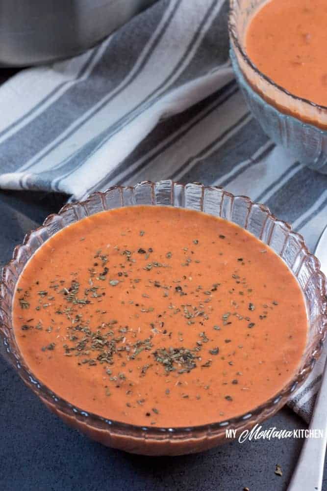 Cream cheese makes this low carb tomato soup extra creamy, while basil gives it a zesty flavor! This easy soup recipe uses no special ingredients and makes a great healthy family meal idea! #lowcarb #thm #trimhealthymama #tomato #tomatosoup #glutenfree #lowcarbsoup #healthymealidea #easylowcarbrecipe #trimhealthymamasoup