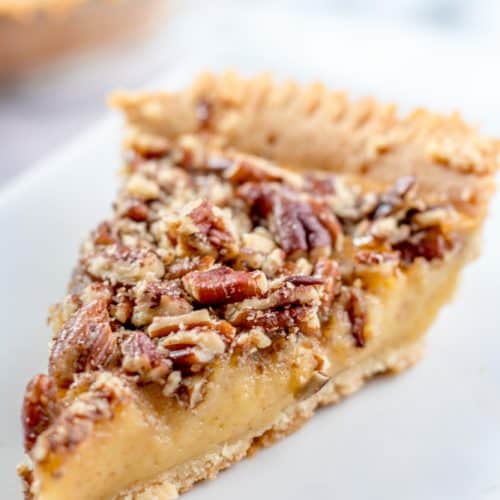This Sugar Free Pecan Pie uses a low carb condensed milk to replace the traditional corn syrup used in pecan pie. This Low Carb Pecan Pie also works great as a Trim Healthy Mama S Dessert Recipe. #lowcarb #sugarfree #pecanpie #lowcarbpecanpie #sugarfreepecanpie #trimhealthymama #thmpecanpie #thms #glutenfreepecanpie