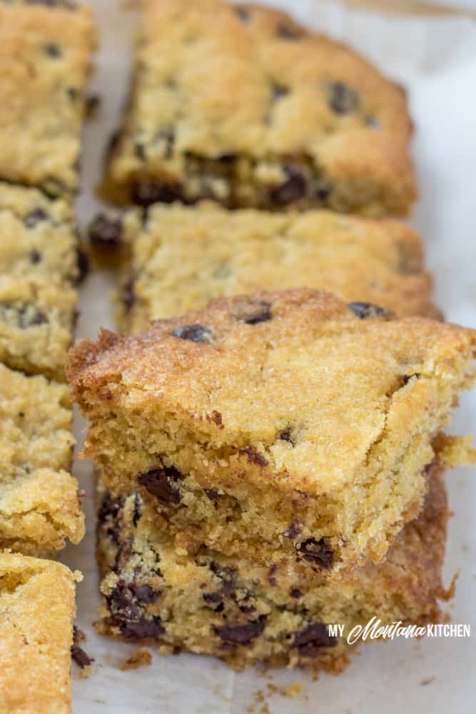 These delicious low carb chocolate chip cookie bars are a decadent treat, and taste just like your favorite cookie! These sugar free chocolate chip bars make a great healthy dessert recipe! #lowcarb #sugarfree