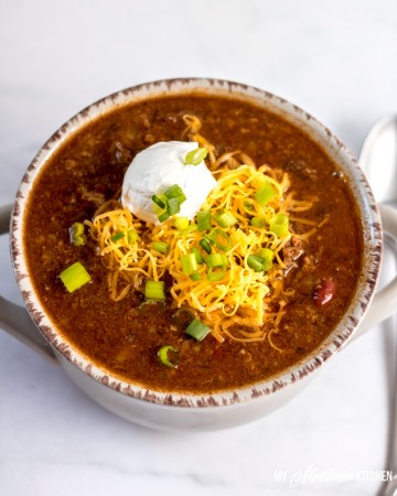 This healthy instant pot chili recipe is versatile, low carb, and easy. It's a one pot weeknight dinner that lends itself well to batch cooking and freezer meals, also. #instantpotchili #lowcarbchili
