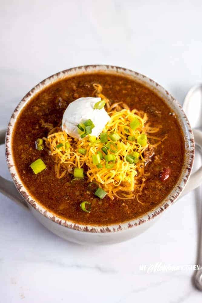 This healthy instant pot chili recipe is versatile, low carb, and easy. It's a one pot weeknight dinner that lends itself well to batch cooking and freezer meals, also. #instantpotchili #lowcarbchili