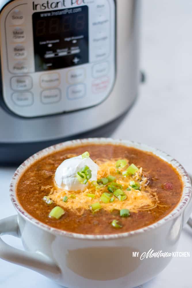 This healthy instant pot chili recipe is versatile, low carb, and easy. It's a one pot weeknight dinner that lends itself well to batch cooking and freezer meals, also. #lowcarbchili #instantpotchili