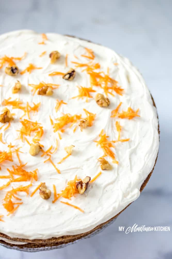 frosted low carb carrot cake with shredded carrots and walnuts