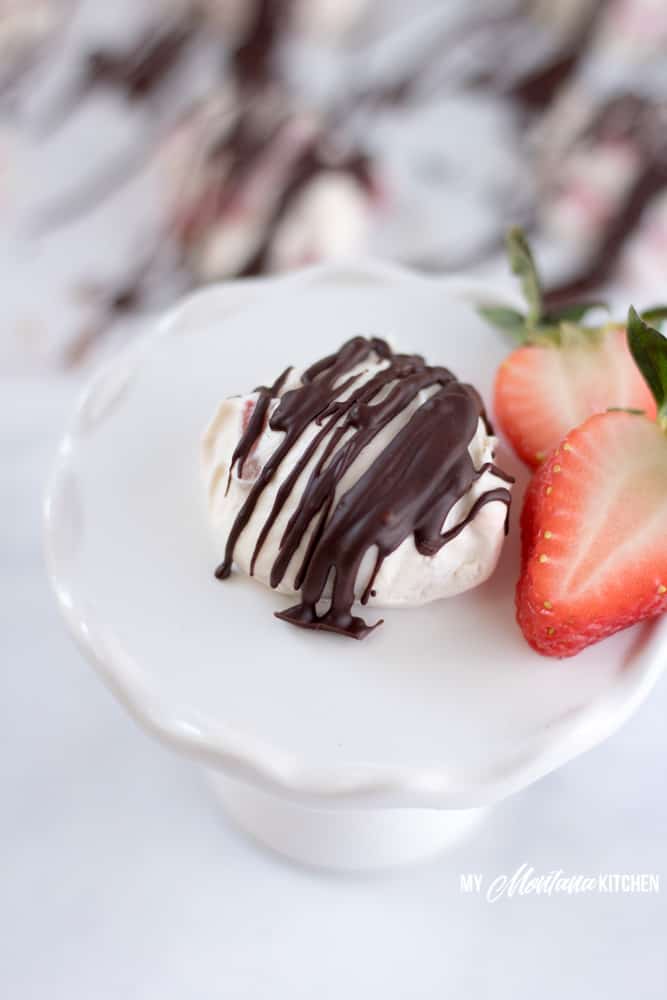 Frozen strawberry cheesecake bites are even more delicious than they sound and so much easier than you'd expect to make. This sugar free, gluten free, low carb dessert is one everyone will love, too! #strawberrycheesecake #lowcarbdessert