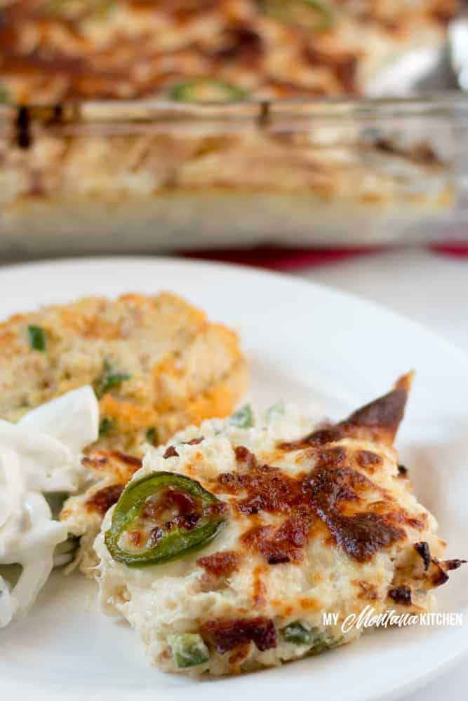 This low carb keto chicken casserole is spicy, savory, and downright mouthwatering. Jalapeño popper chicken casserole with bacon is about to become a weeknight favorite in your home when you need an easy, one dish keto dinner that the whole family will enjoy. Serve it up all on its own or with your vegetables or fresh salad on the side. #ketochickencasserole #lowcarbchickenrecipe