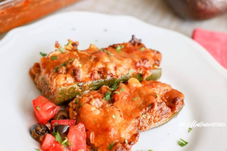 low carb beef enchilada zucchini on white plate