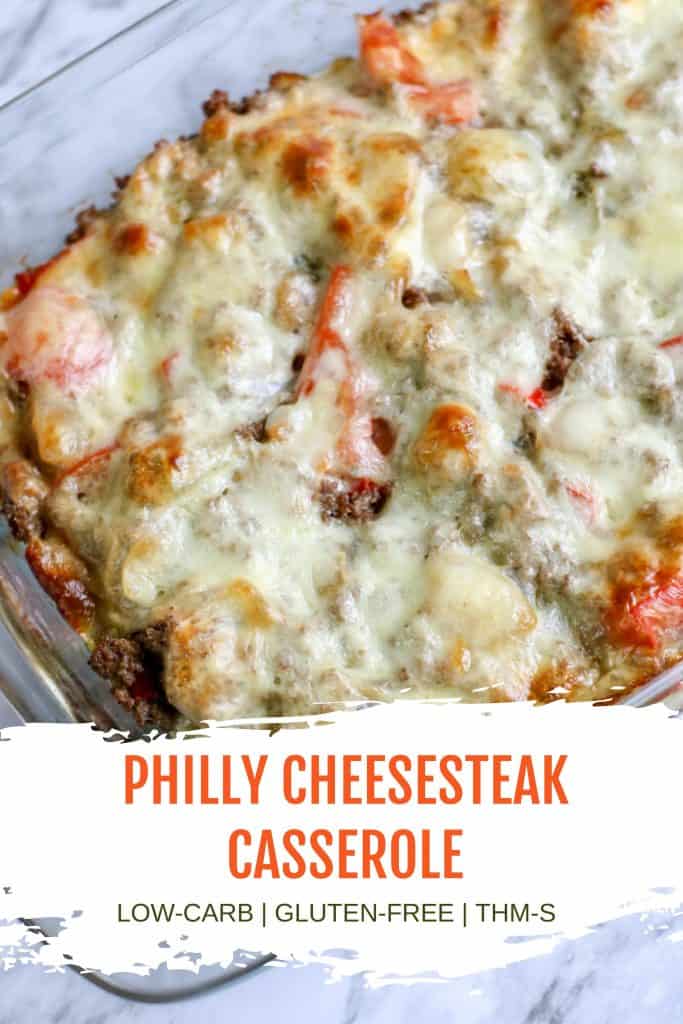 philly cheesesteak casserole in glass dish pinterest image