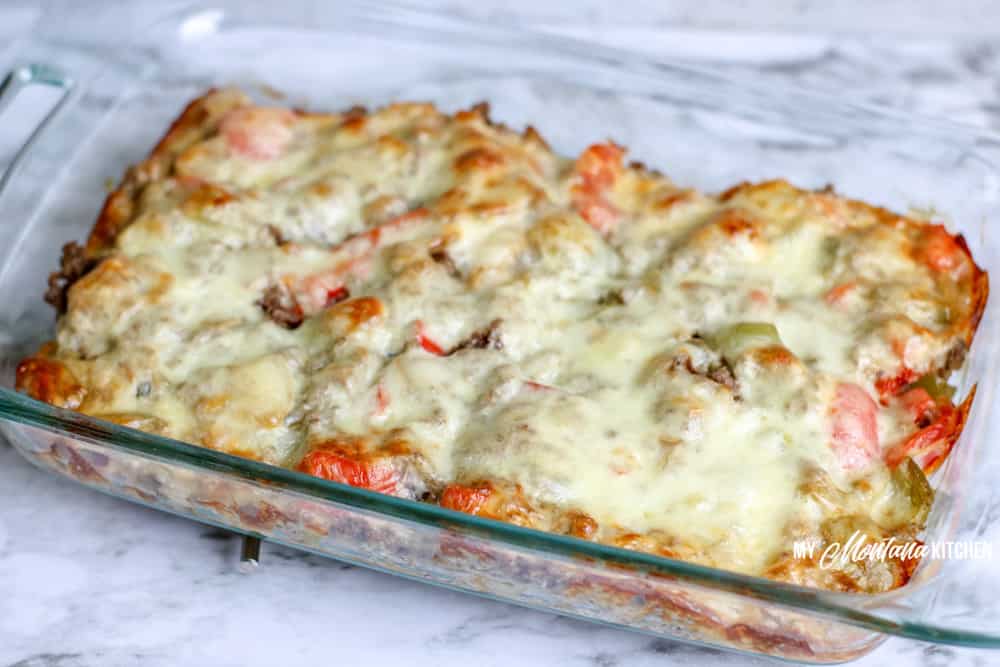 baked philly cheesesteak casserole with melted cheese