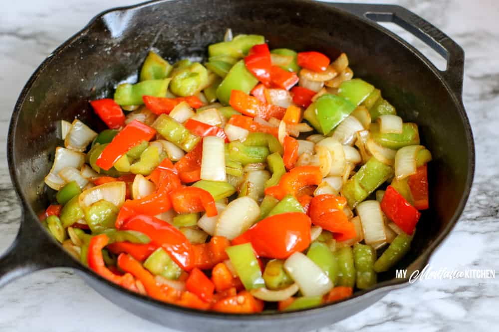 sauteed red and green peppers in cast iron skillet