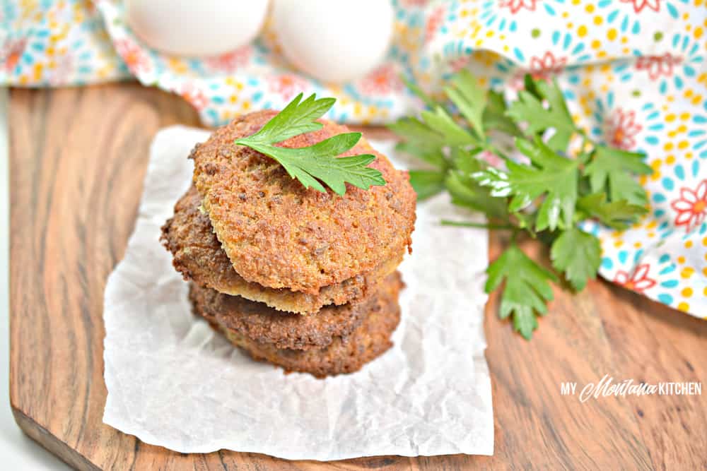 sausage breakfast cookies stacked on wax paper