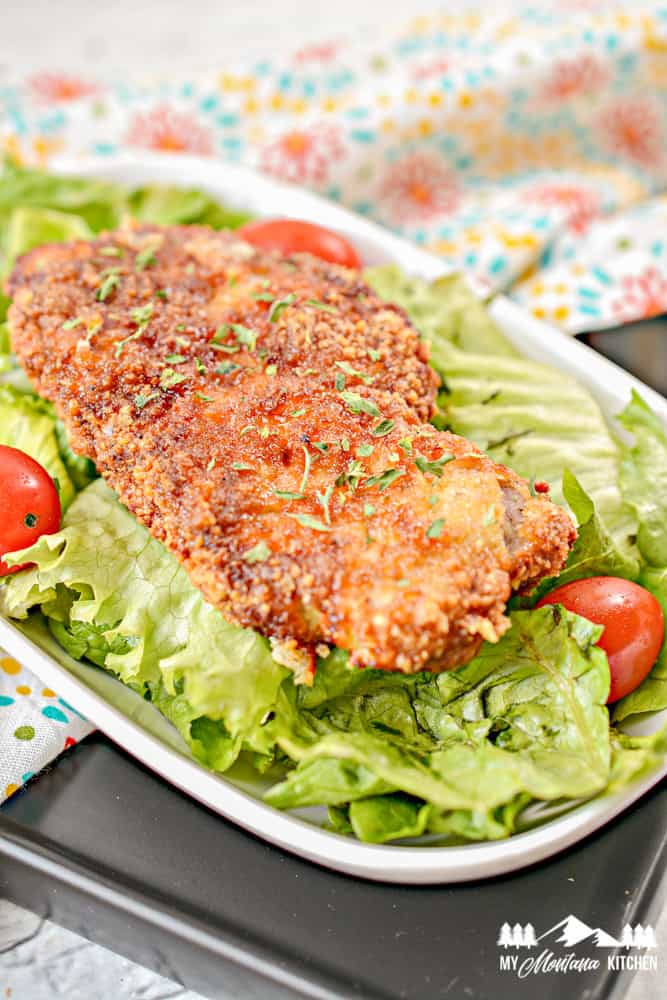  air fryer Parmesan pork chop on lettuce