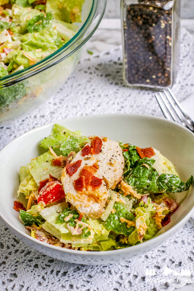 chicken cobb salad in white bowl