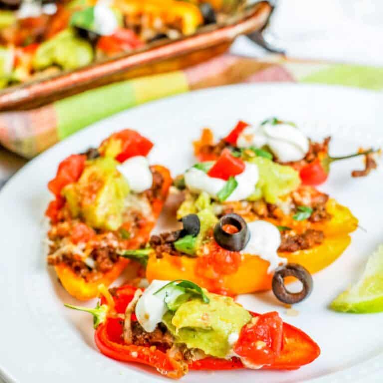 bell pepper nachos with olives on white plate