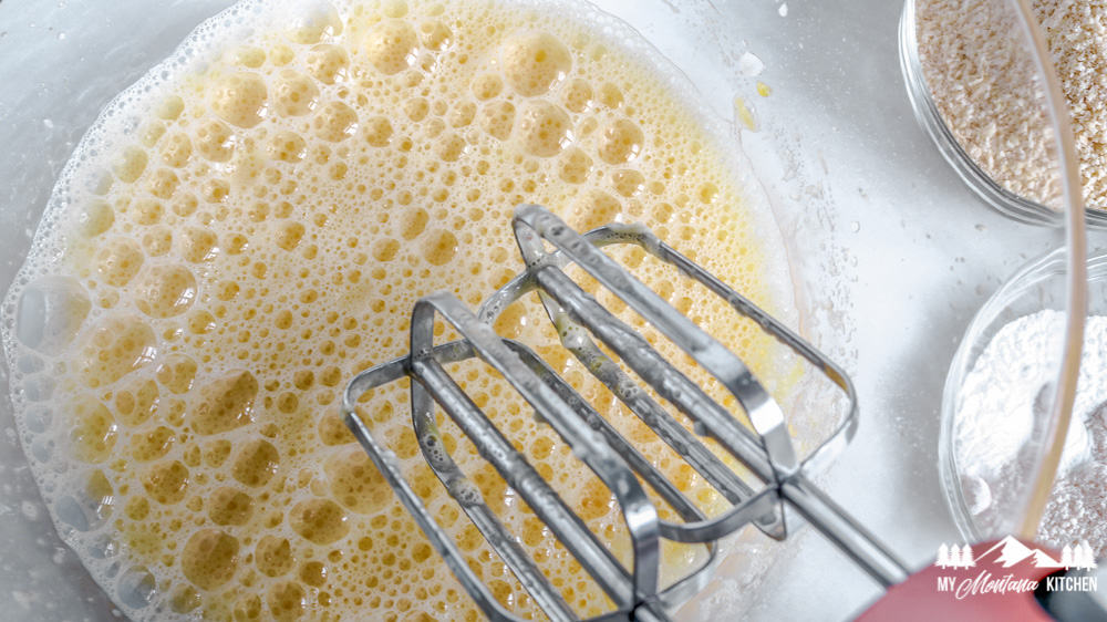 With a hand mixer, combine eggs, vanilla, baking powder, and Swerve sugar until frothy.