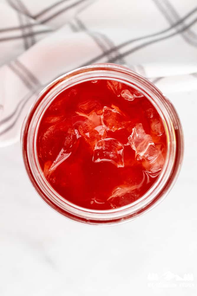 red tropical punch good girl moonshine in mason jar