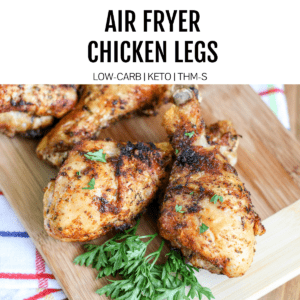 cooked chicken legs with green herbs