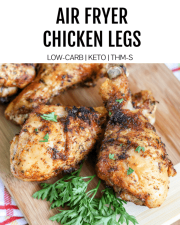 cooked chicken legs with green herbs